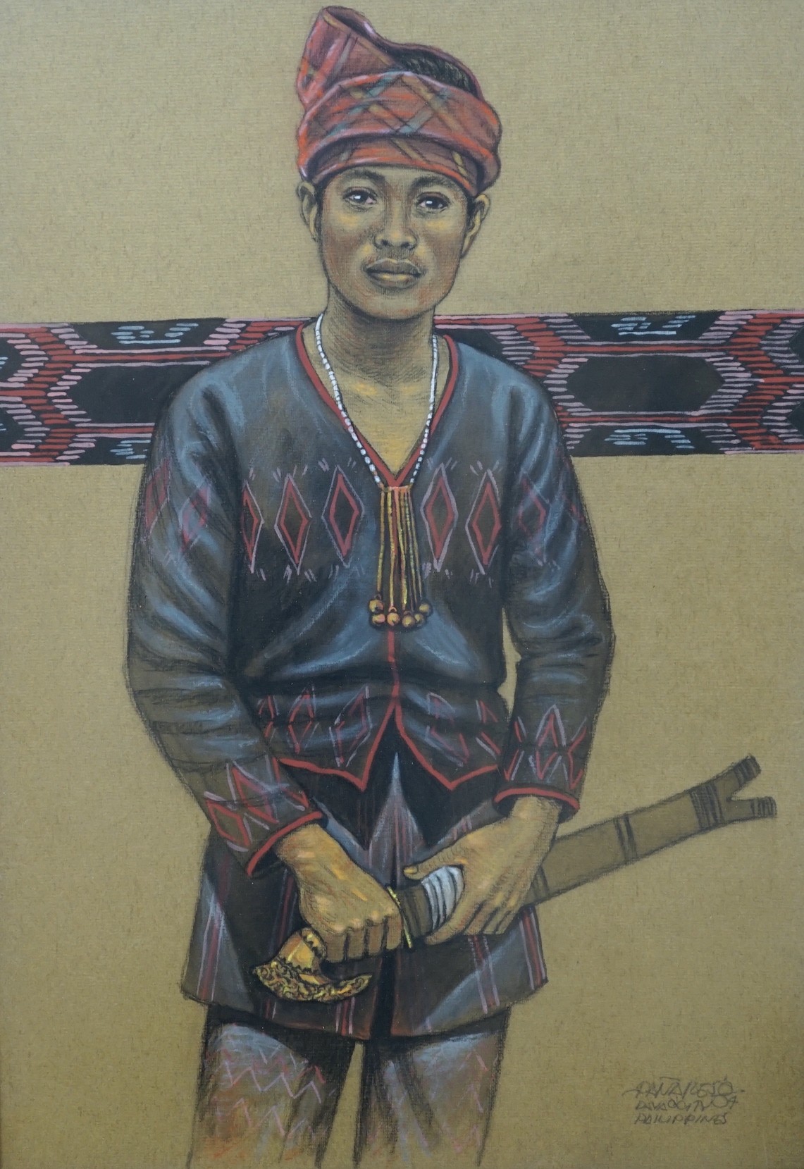 Panareso, pastel, Portrait of a young man holding a kris, signed and inscribed Philippines '04, 48 x 33cm